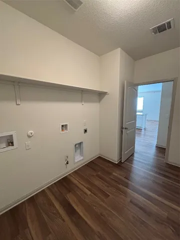 a house with yard in front of it