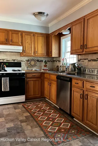 a bathroom with a toilet and a sink