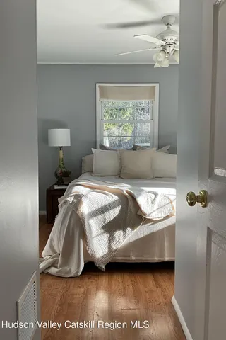 a view of swimming pool with outdoor seating and trees