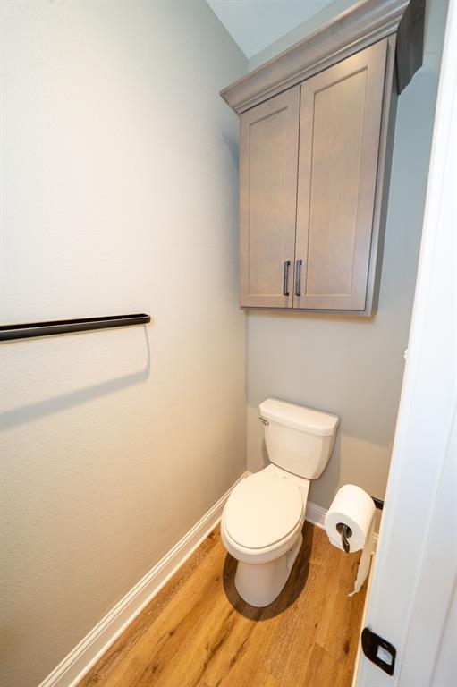 132 Addie Way Tuscola, TX 79562 - Photo 16 of 37 a white toilet sitting next to a shower
