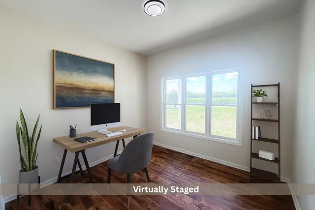 a workspace with furniture and wooden floor