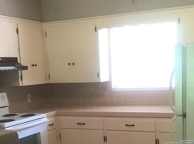 a close view of a sink in the kitchen