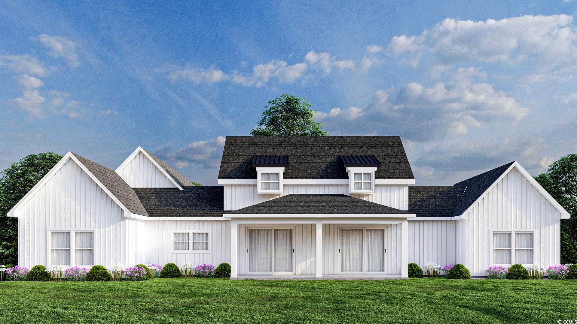 2172 Pettus Way Surfside Beach, SC 29575 - Photo 5 of 6 The rear of the home with large covered porch. This home will be mirrored to the left instead of the right. So this will be flipped.