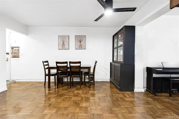a livingroom with furniture and a flat screen tv