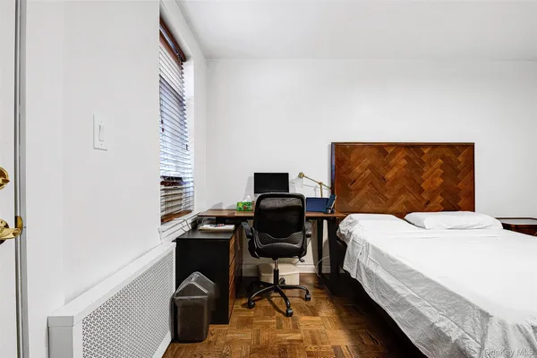 a view of a hallway with a bedroom