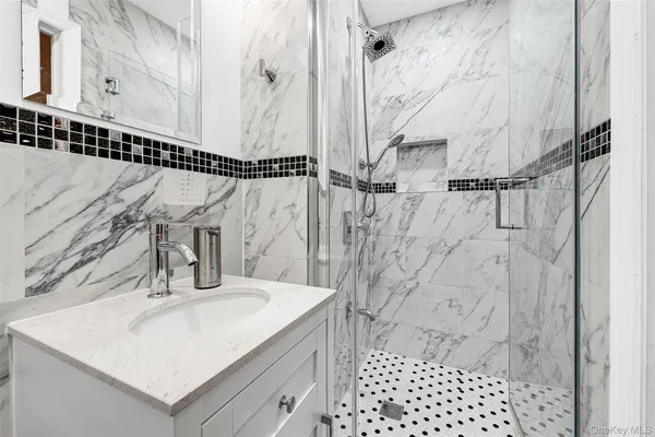 a bed room with a bed and a television