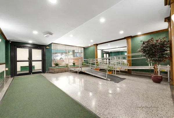 a view of a hallway with staircase