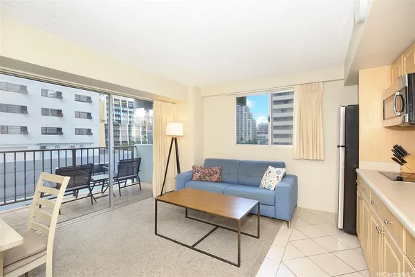 a living room with furniture and a window