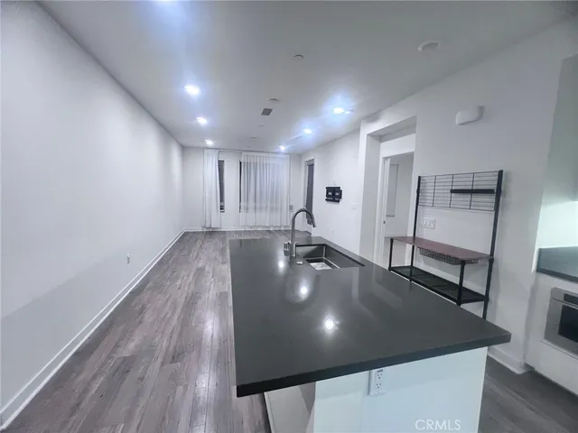 a large room with lots of wooden furniture