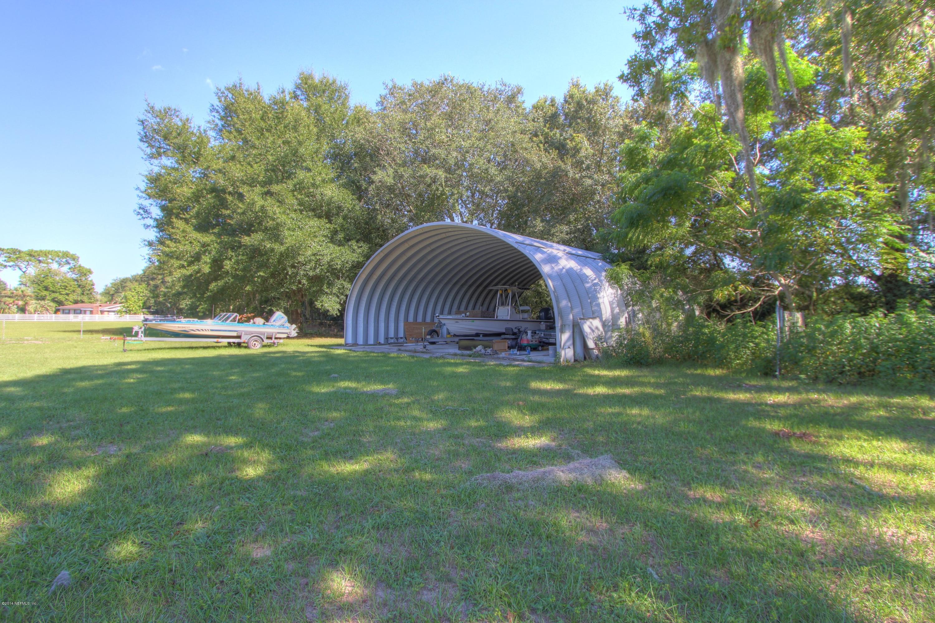 8976 Snellgrove Road Jacksonville, FL 32220 - Photo 13 of 43 Backyard with Hanger