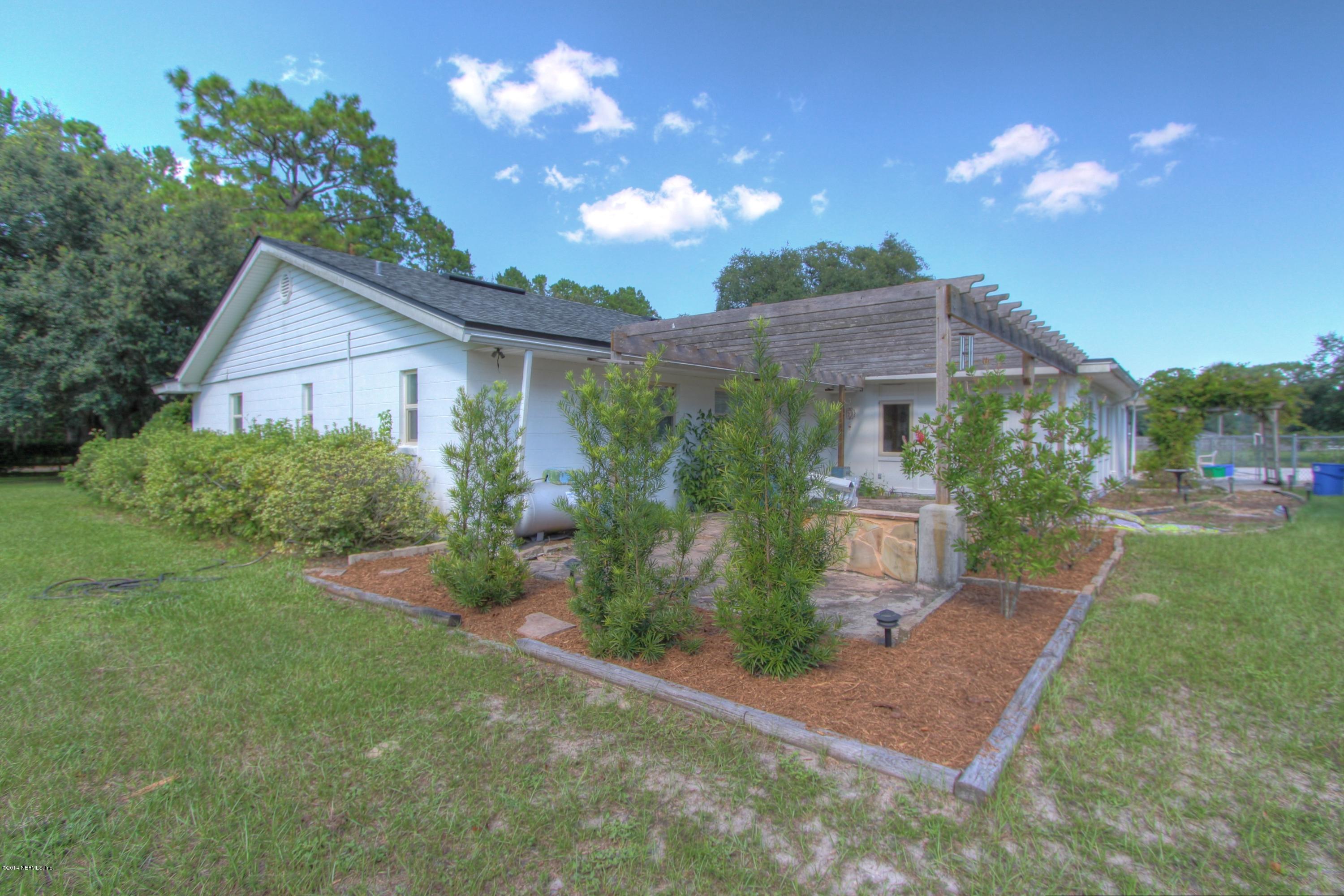 8976 Snellgrove Road Jacksonville, FL 32220 - Photo 6 of 43 Side and Pergola
