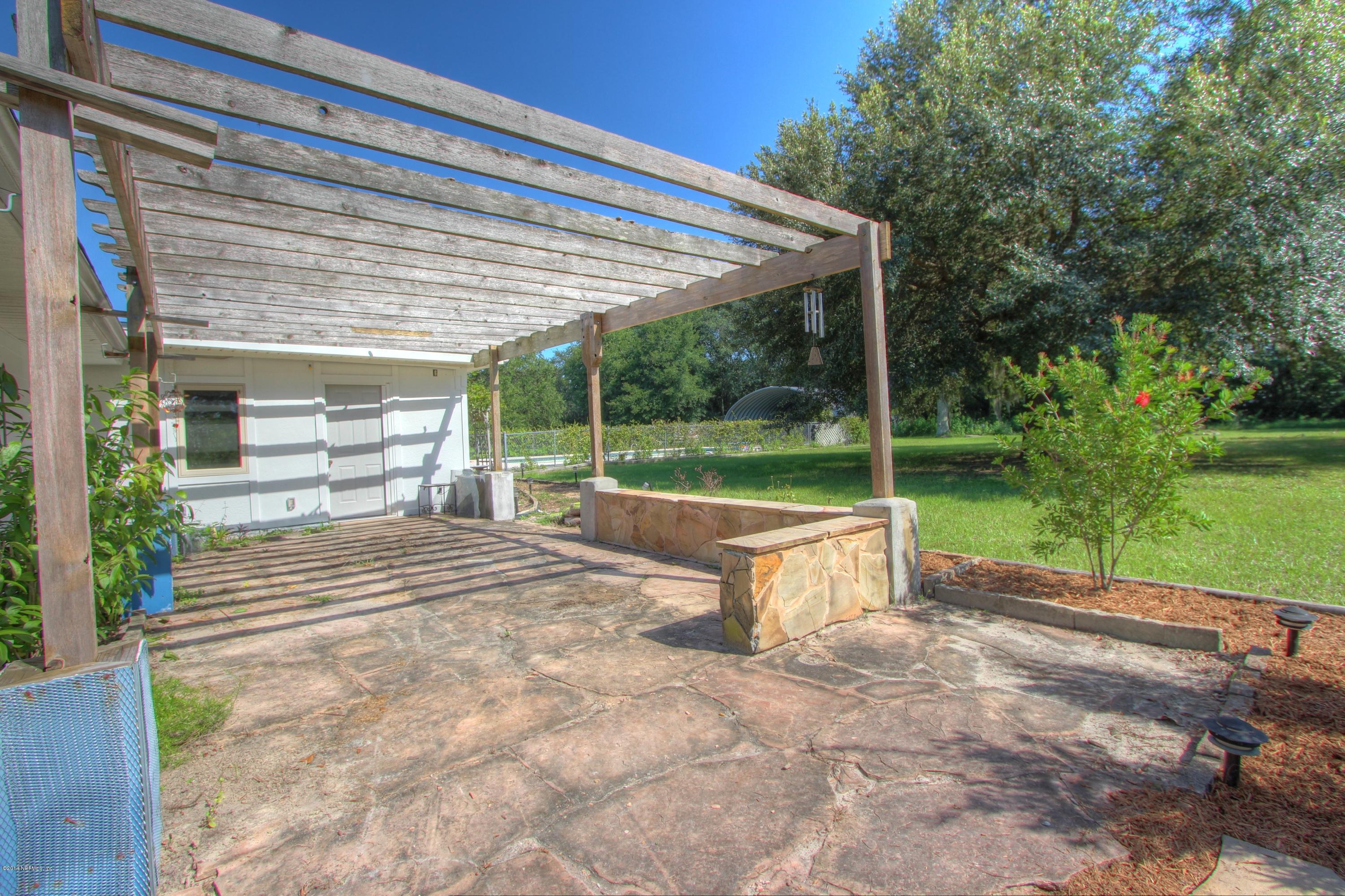 8976 Snellgrove Road Jacksonville, FL 32220 - Photo 9 of 43 Pergola area with Flagstone Floor