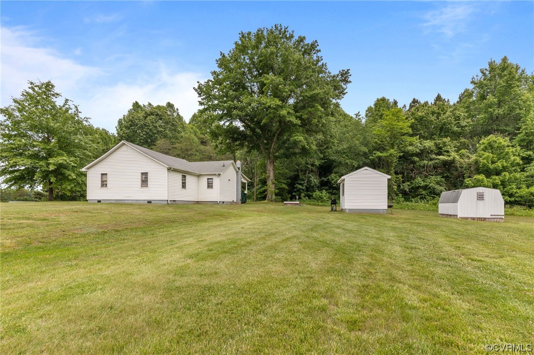 3980 Cedar Plains Road Sandy Hook, VA 23153 - Photo 16 of 18 a house view with a outdoor space
