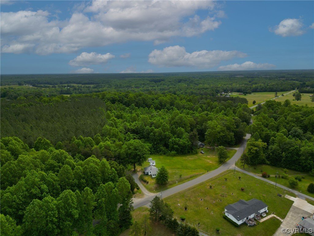 3980 Cedar Plains Road Sandy Hook, VA 23153 - Photo 18 of 18 a view of a golf course with a lake