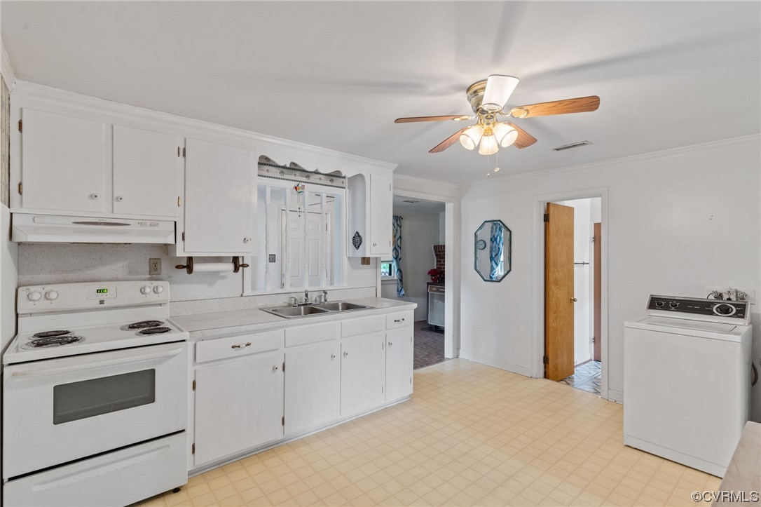 3980 Cedar Plains Road Sandy Hook, VA 23153 - Photo 9 of 18 a kitchen with cabinets stainless steel appliances and a chandelier