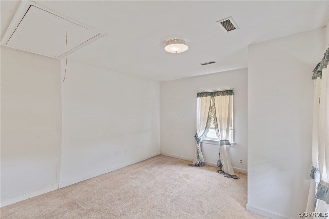 3980 Cedar Plains Road Sandy Hook, VA 23153 - Photo 10 of 18 a view of an empty room with a window