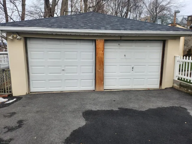 a wooden door in front of a house