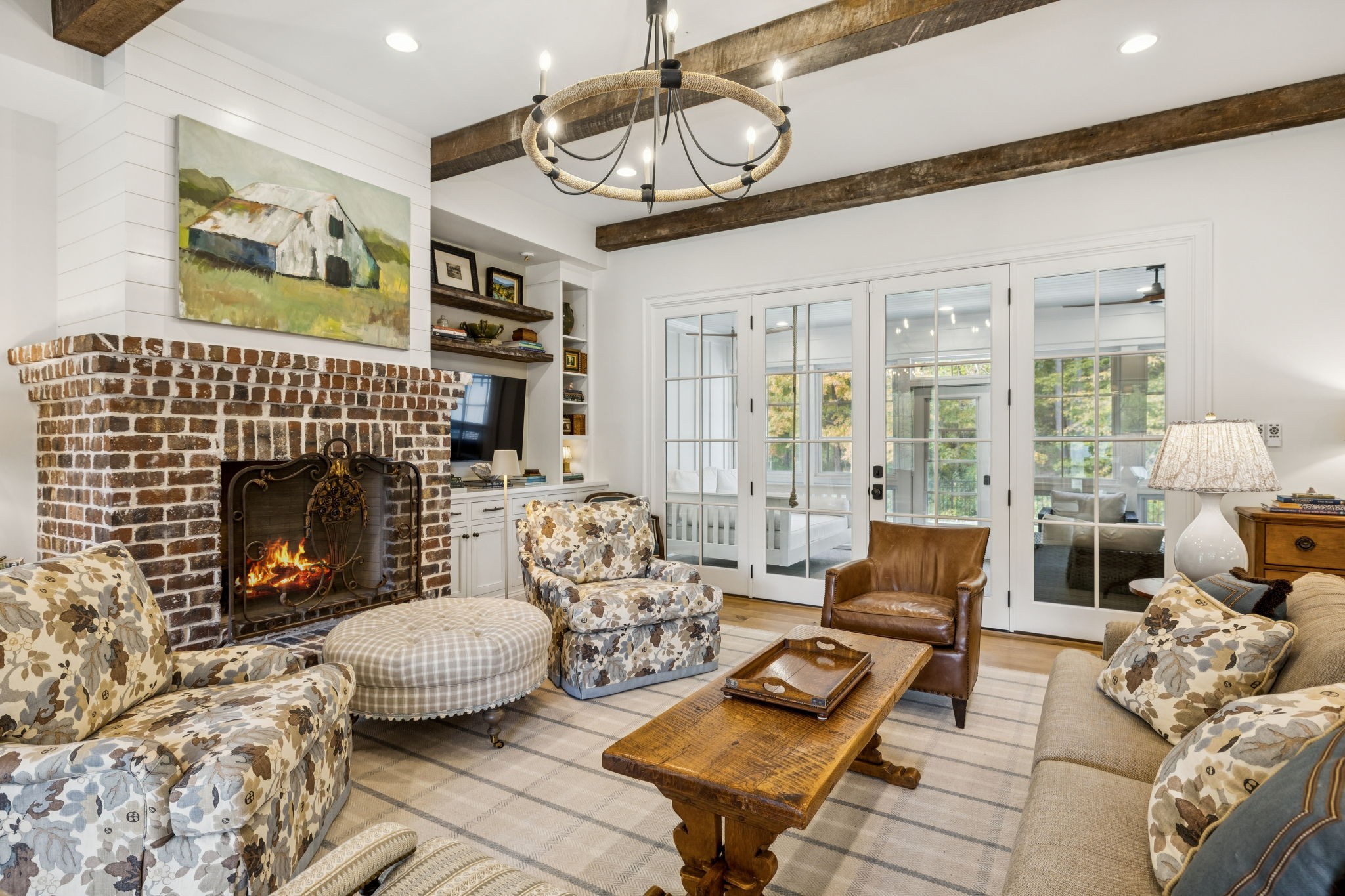 4388 Stenberg Road Whites Creek, TN 37189 - Photo 14 of 61 a living room with furniture a rug and a fireplace