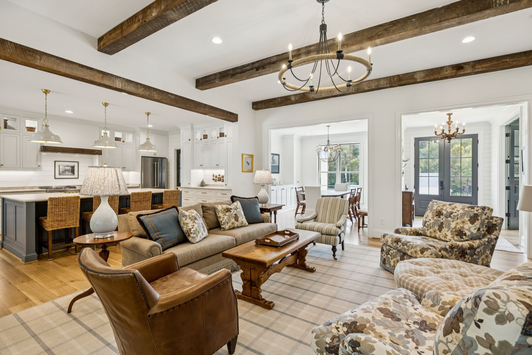 4388 Stenberg Road Whites Creek, TN 37189 - Photo 16 of 61 a living room with furniture a large window and a chandelier
