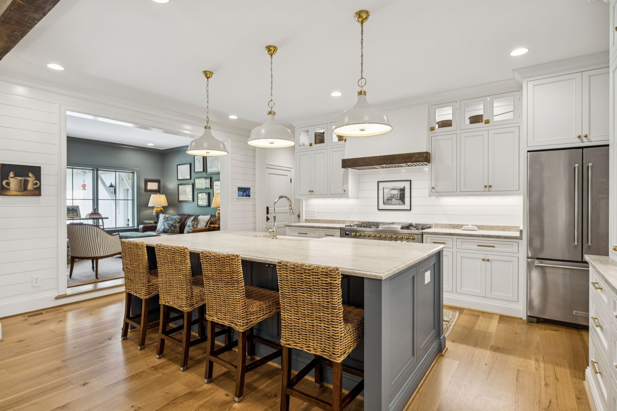 4388 Stenberg Road Whites Creek, TN 37189 - Photo 17 of 61 a kitchen with stainless steel appliances granite countertop a table chairs refrigerator and sink