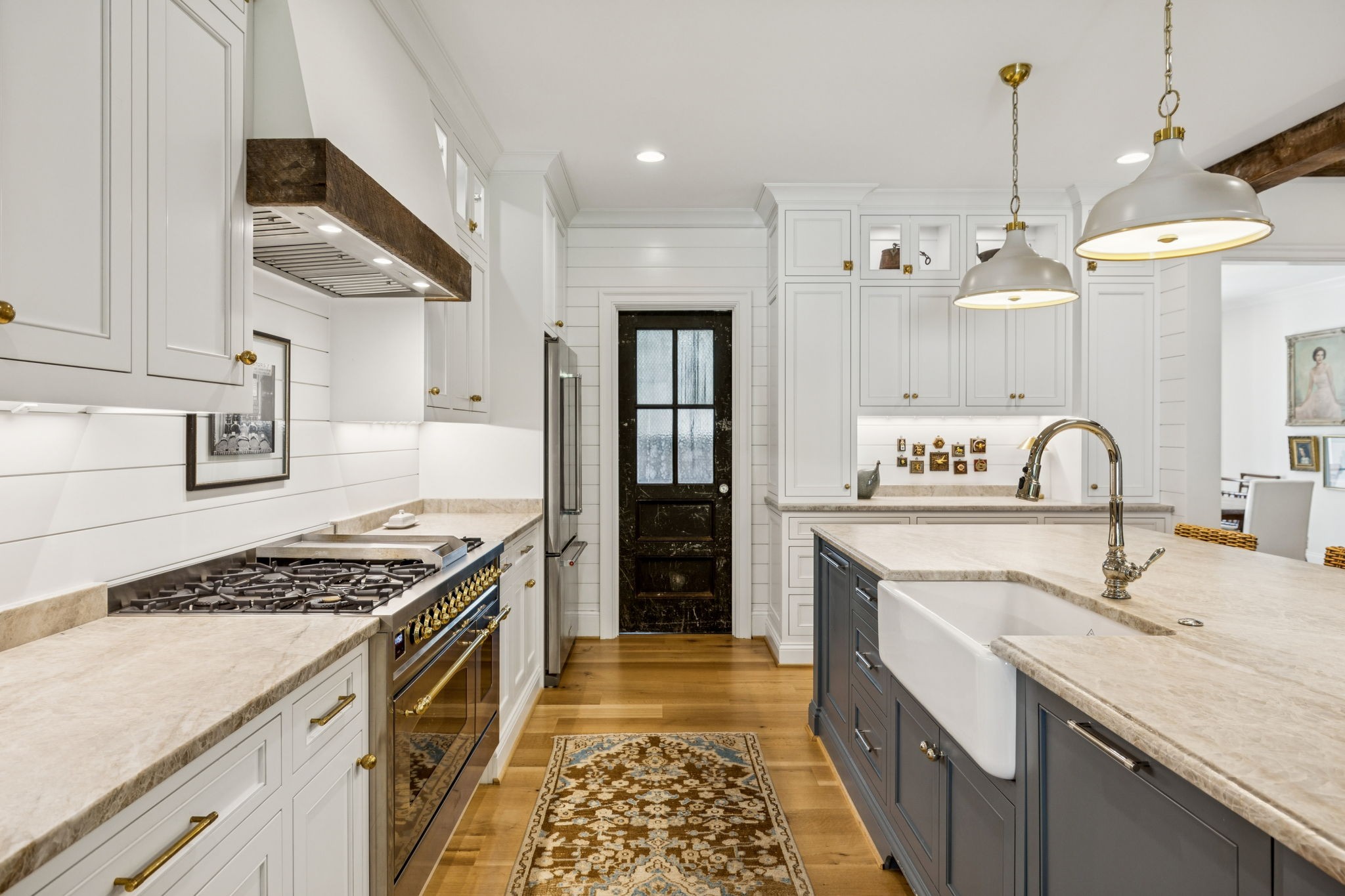 4388 Stenberg Road Whites Creek, TN 37189 - Photo 22 of 58 a kitchen with granite countertop a sink stove and cabinets