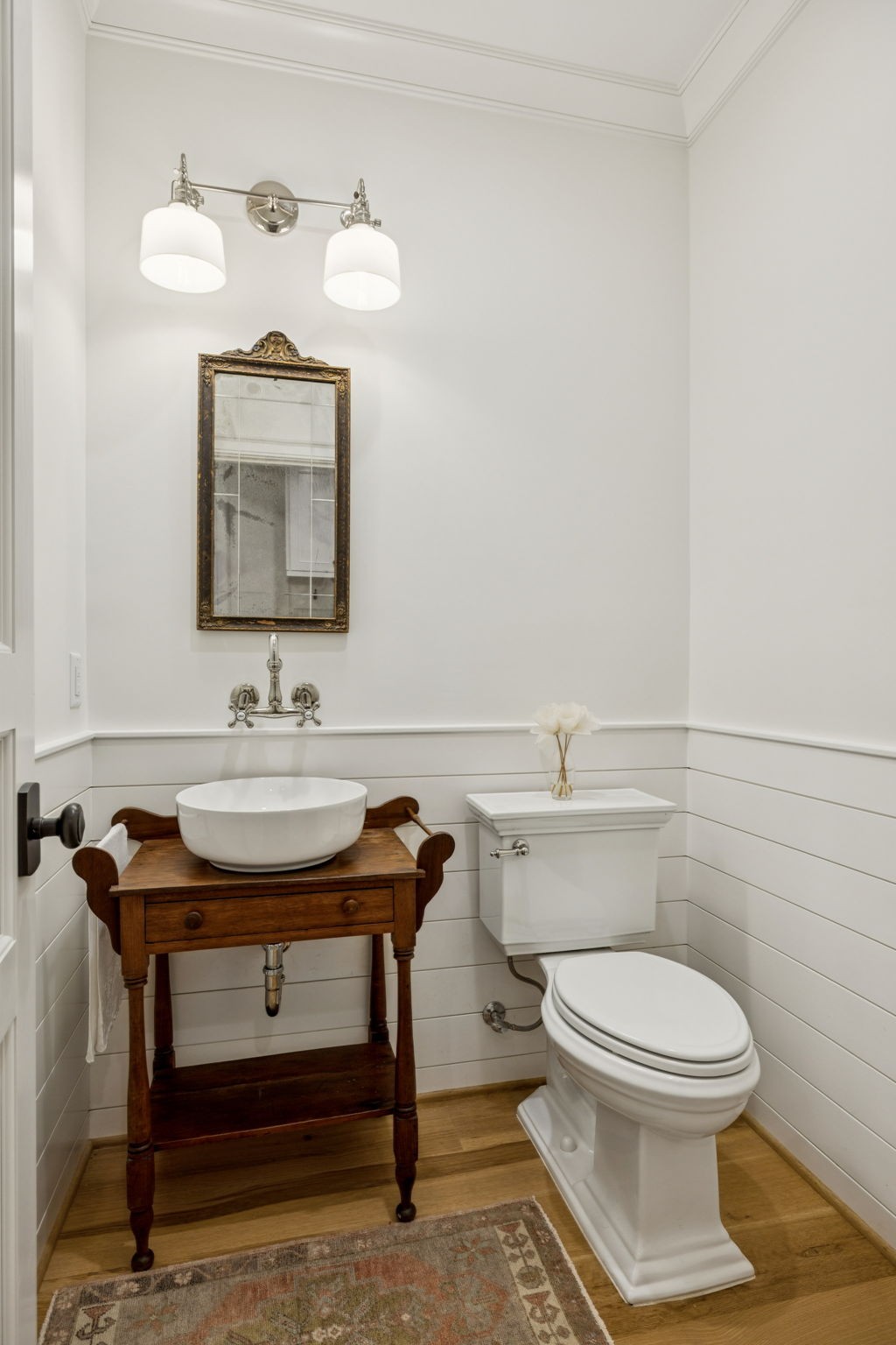 4388 Stenberg Road Whites Creek, TN 37189 - Photo 28 of 61 a bathroom with a toilet a sink and mirror