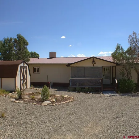 a front view of house with yard