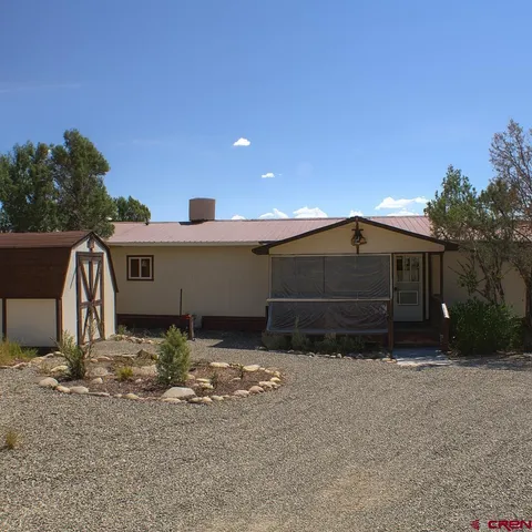 a front view of house with yard