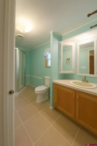 a bath room with a sink and a mirror