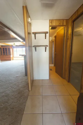 a bathroom with a glass door shower