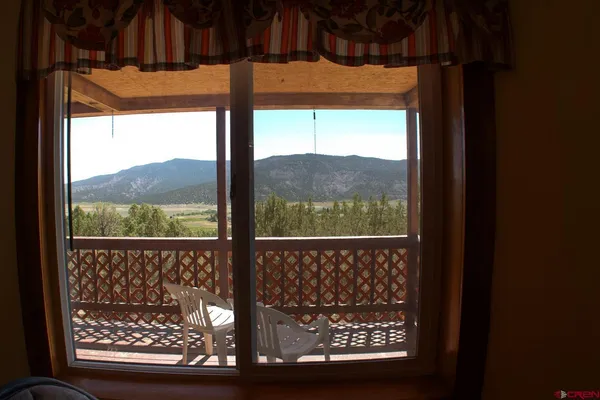 a view of a lake and mountain in the back