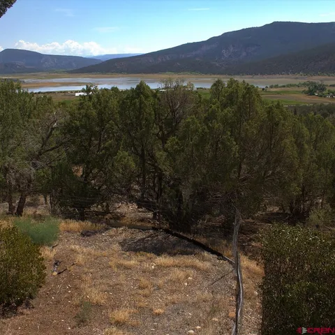 a view of a lake and mountain