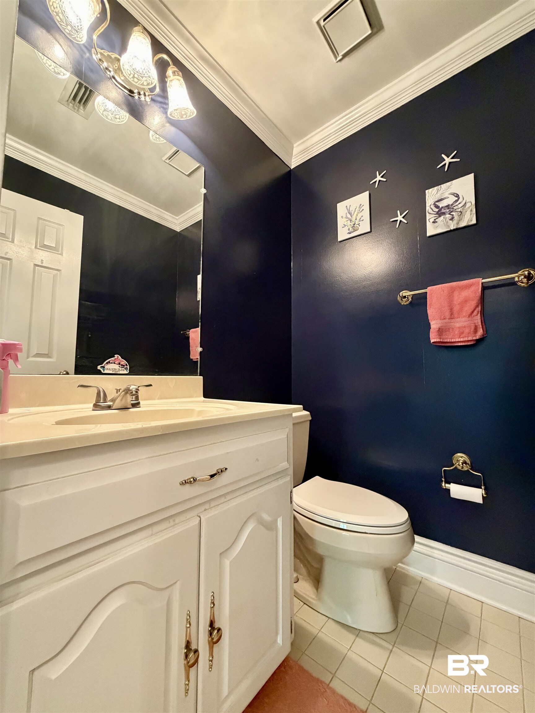 2944 Appleton Road Brewton, AL 36426 - Photo 30 of 65 Bathroom with light tile patterned floors, vanity, and crown molding