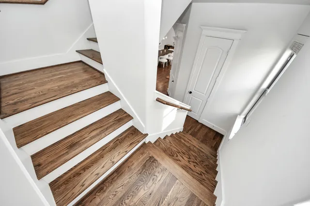 a kitchen with stainless steel appliances a refrigerator sink and cabinets