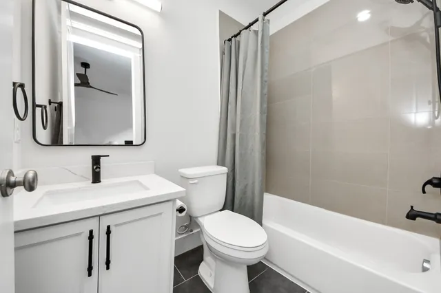 a view of a livingroom with furniture and wooden floor