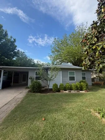 front view of house with a yard