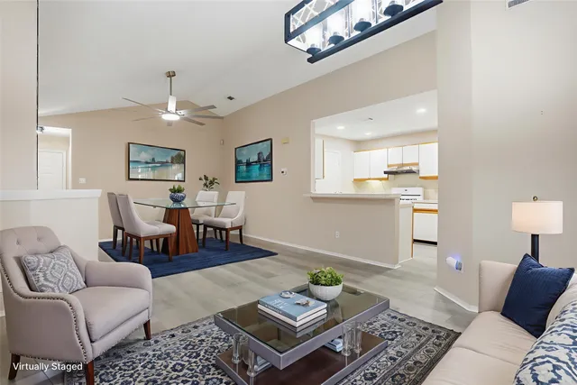 a kitchen with a sink appliances and cabinets