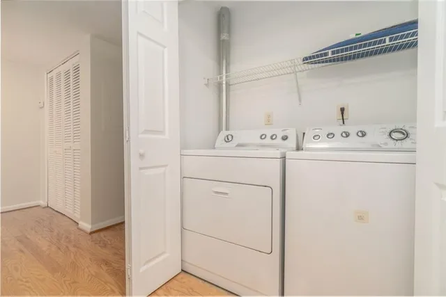 a utility room with dryer and washer