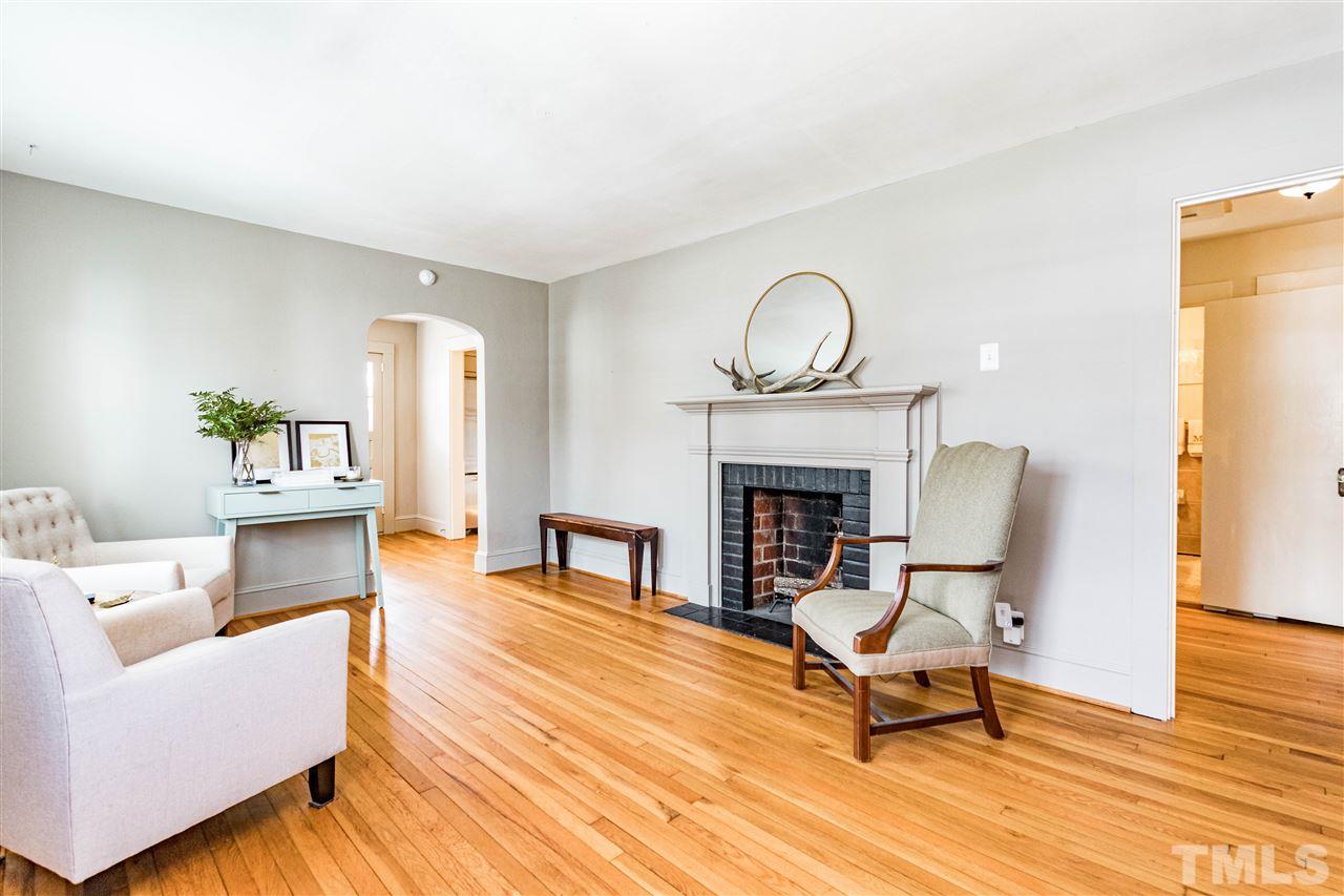 2103 Reaves Drive Raleigh, NC 27608 - Photo 2 of 30 Sellers have never used fireplace, but it certainly adds to the ambiance!
