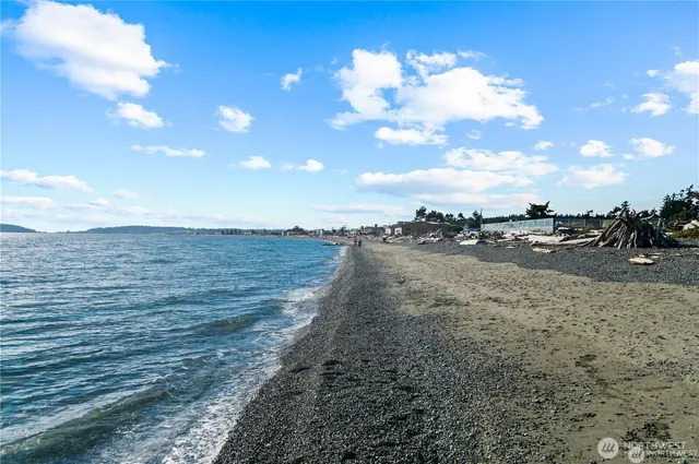 a view of a park with swings and slides