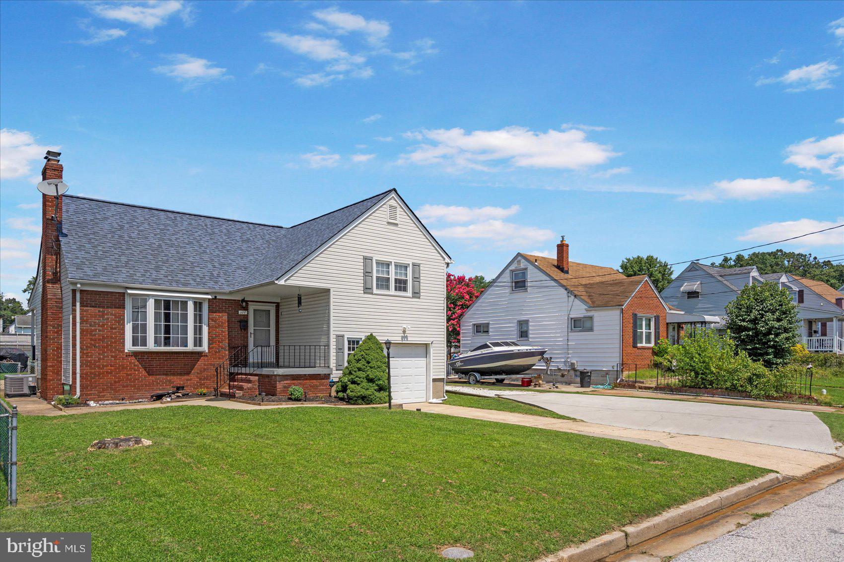 300 Nicholson Road Baltimore, MD 21221 - Photo 41 of 42 a front view of house with yard and green space