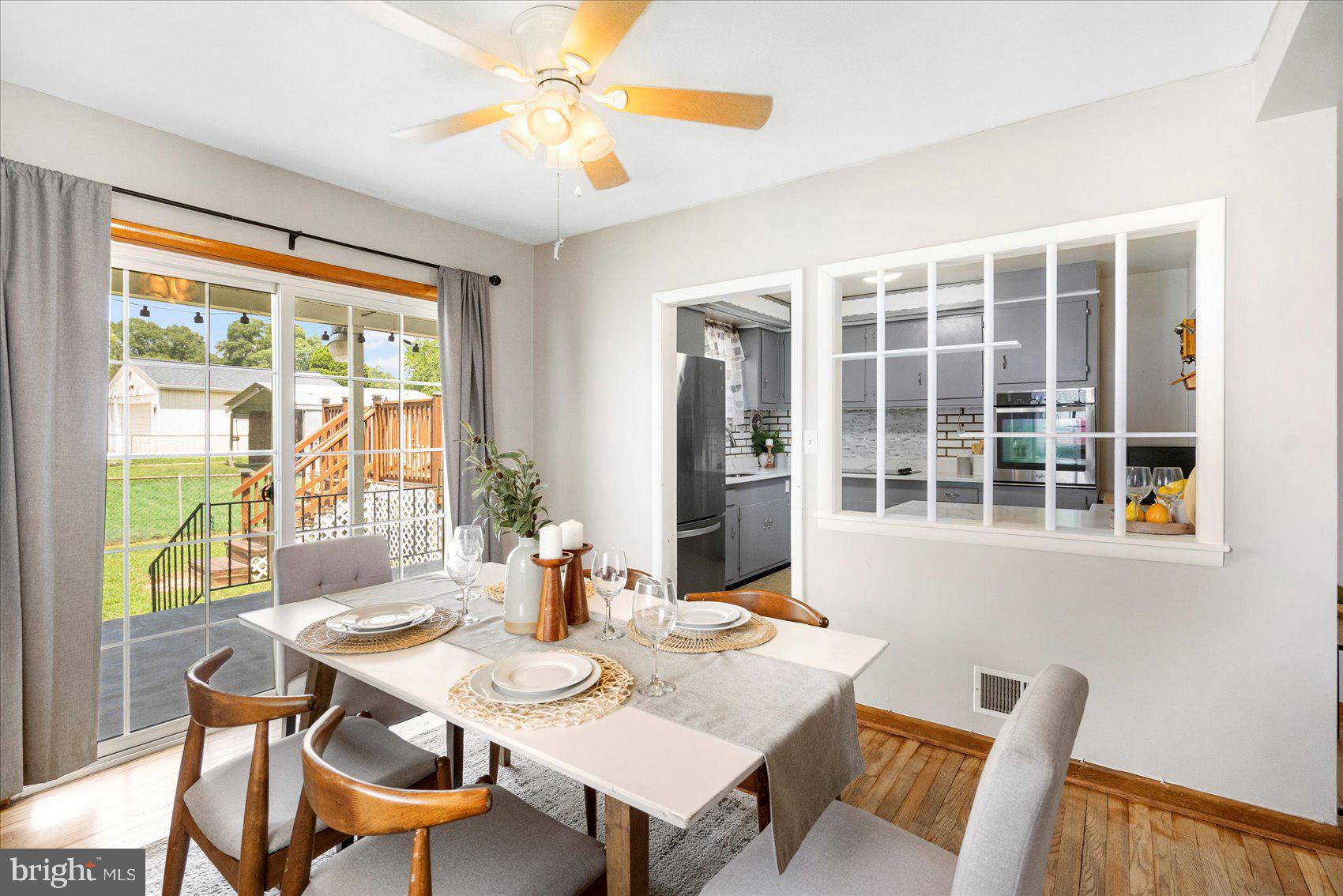 300 Nicholson Road Baltimore, MD 21221 - Photo 7 of 42 a view of a dining room with furniture window and outside view