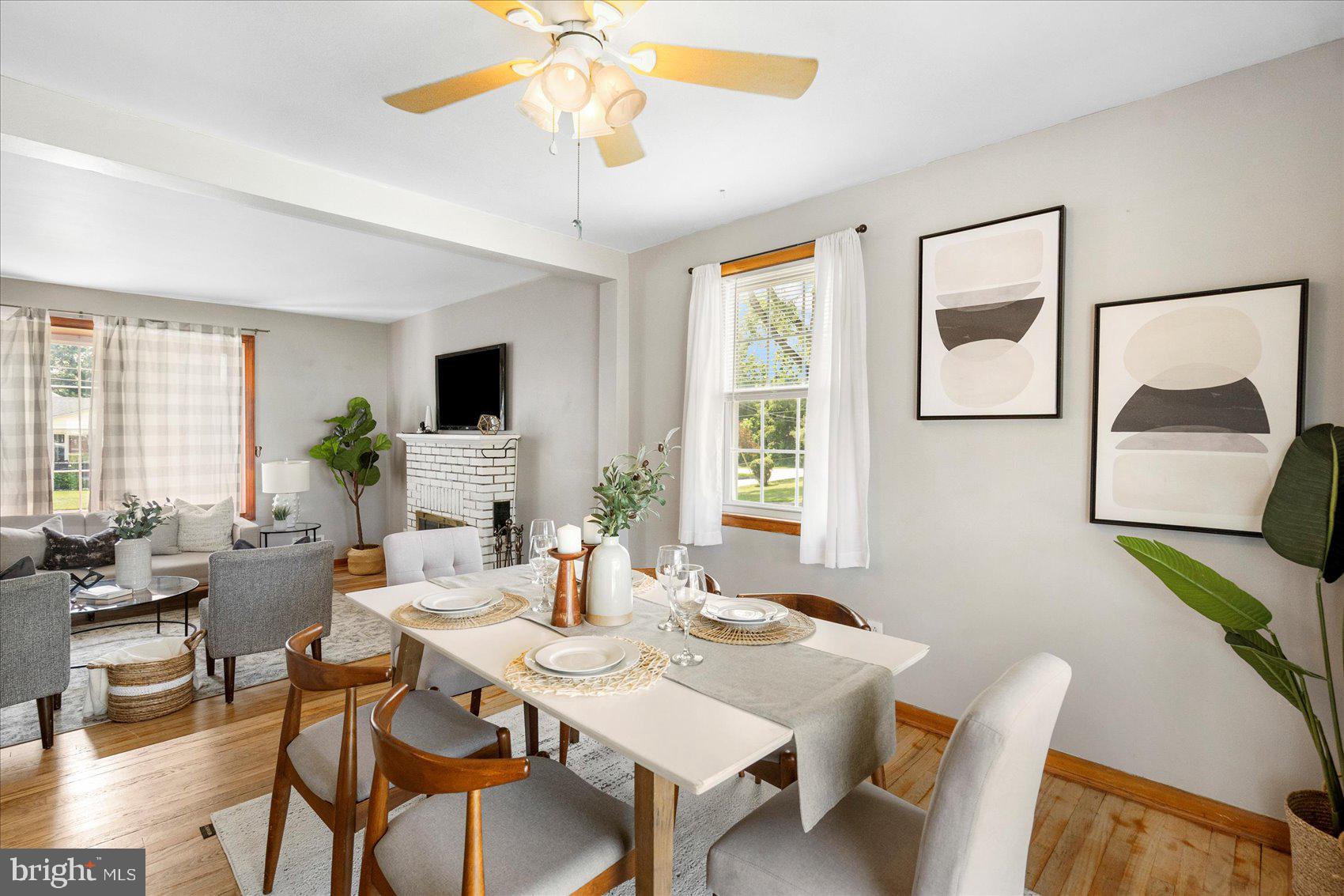 300 Nicholson Road Baltimore, MD 21221 - Photo 9 of 42 a view of a dining room with furniture window and wooden floor