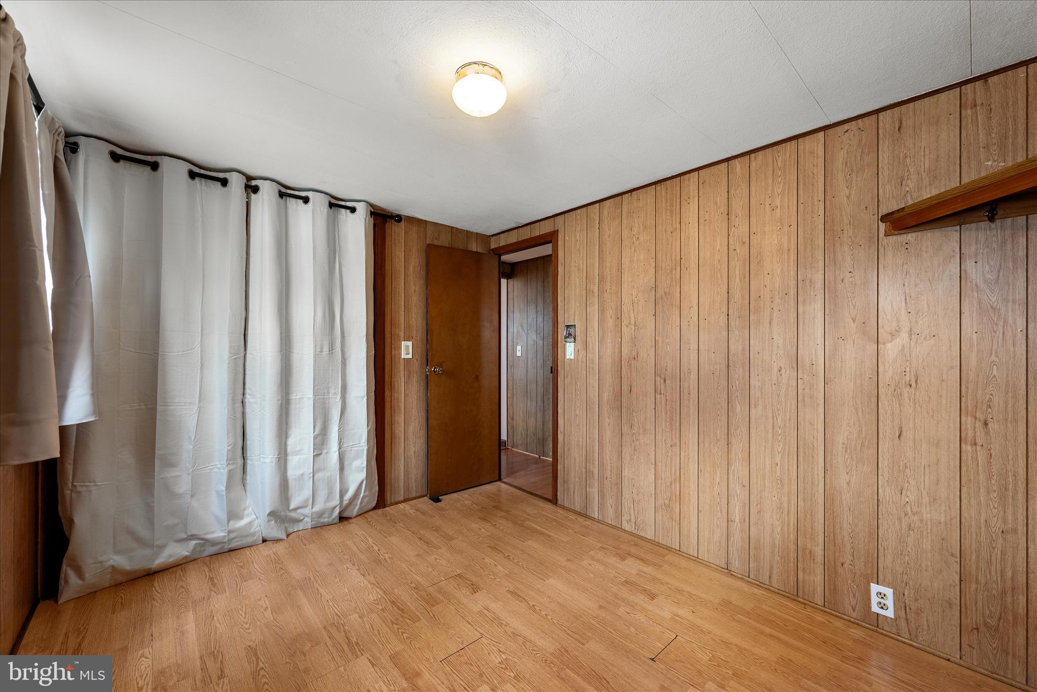 53 Anvil Road Kearneysville, WV 25430 - Photo 14 of 44 a view of a room with a wooden door