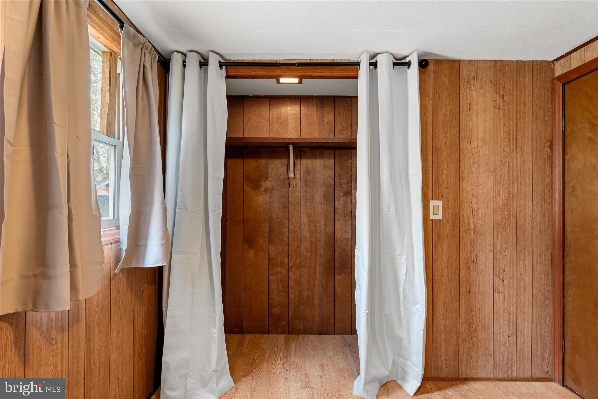 53 Anvil Road Kearneysville, WV 25430 - Photo 15 of 44 a view of walk in closet with clothes and shoes