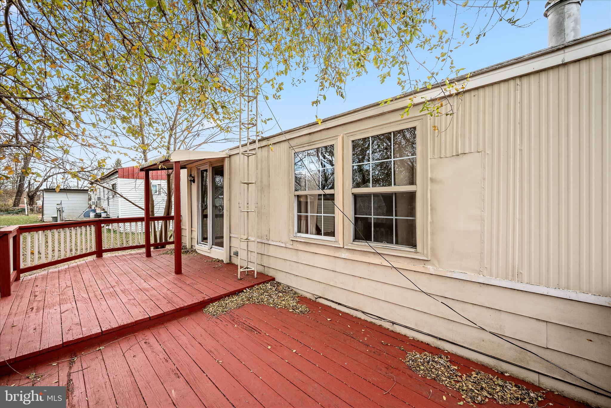 53 Anvil Road Kearneysville, WV 25430 - Photo 23 of 44 a view of porch with wooden floor and fence