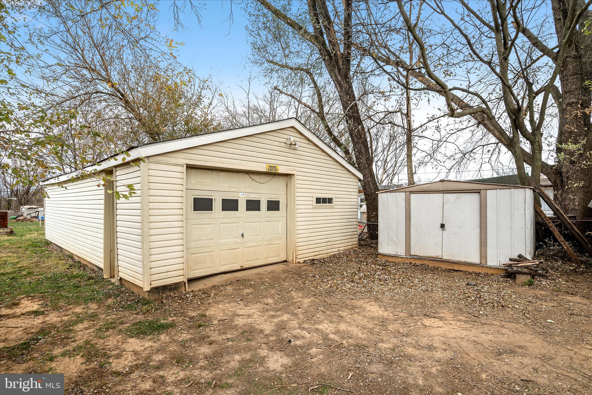 53 Anvil Road Kearneysville, WV 25430 - Photo 25 of 44 a view of a house with a white fence and a large tree