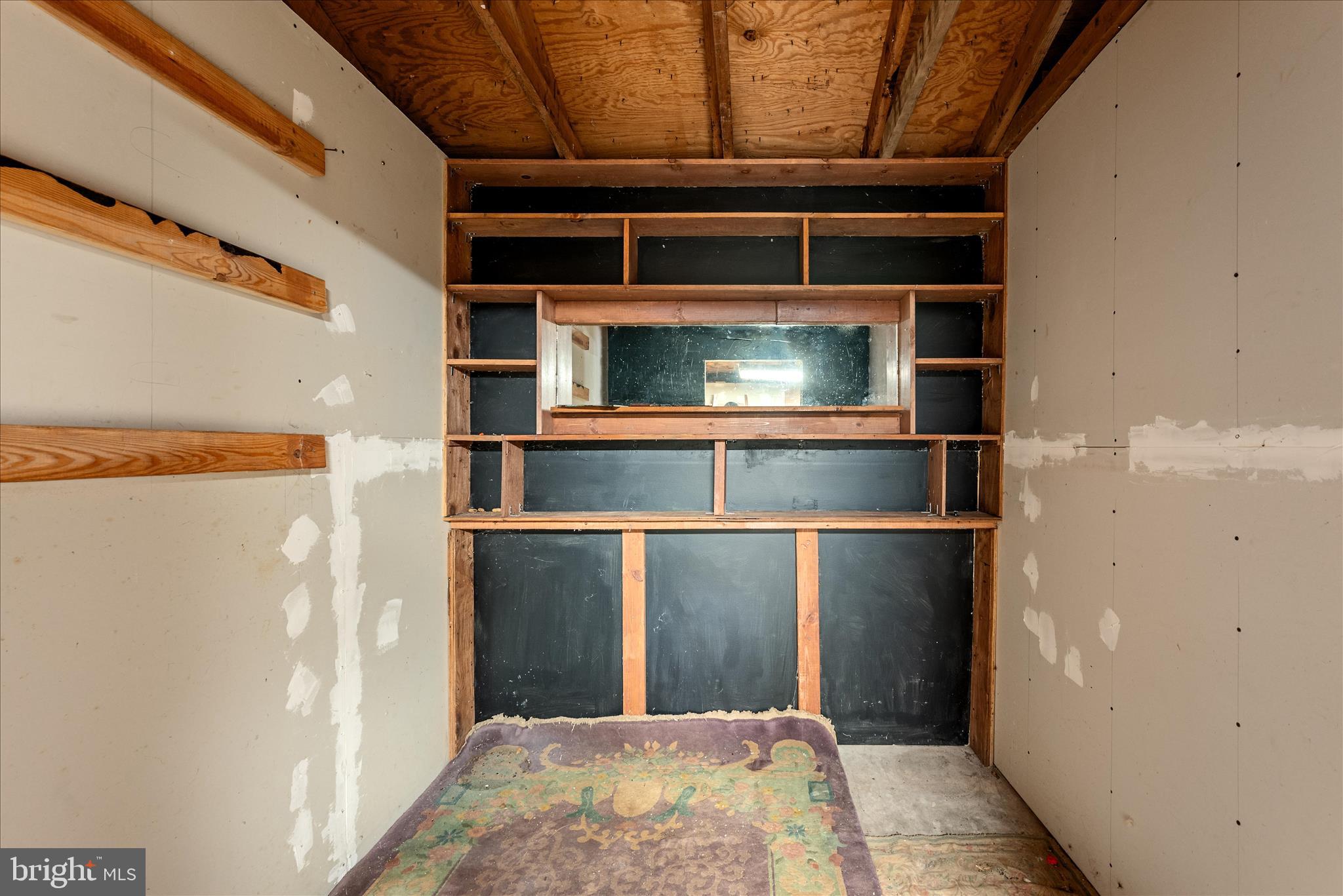 53 Anvil Road Kearneysville, WV 25430 - Photo 31 of 44 a view of a hallway with wooden shelves
