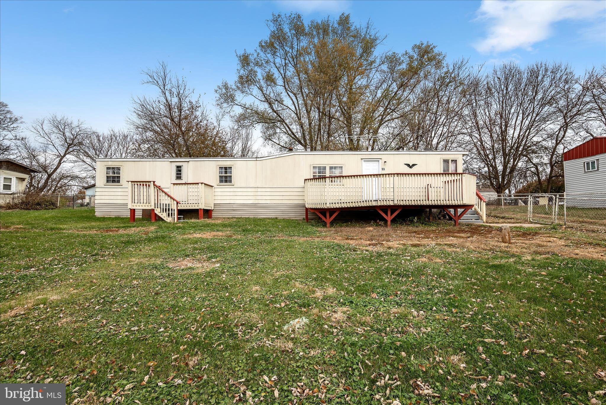 53 Anvil Road Kearneysville, WV 25430 - Photo 33 of 44 a view of a house with a yard and sitting area
