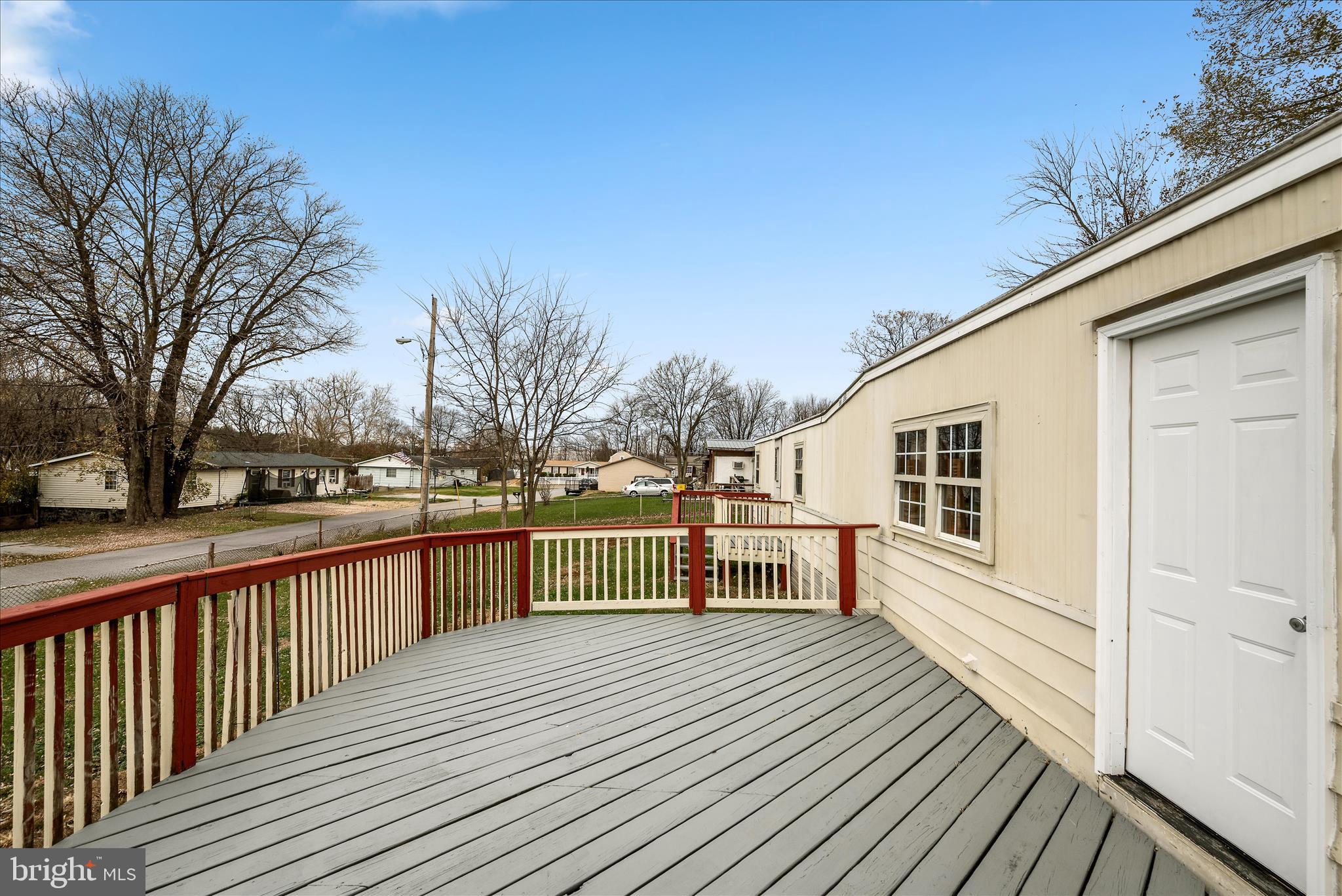 53 Anvil Road Kearneysville, WV 25430 - Photo 37 of 44 a view of a balcony with wooden floor and fence
